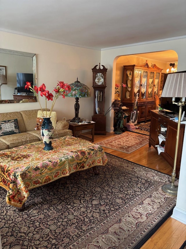 42-30 196th St, Flushing, NY 11358 - bedroom with crown molding, arched walkways, and wood finished floors