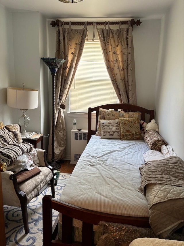 42-30 196th St, Flushing, NY 11358 - bedroom with radiator heating unit and wood finished floors
