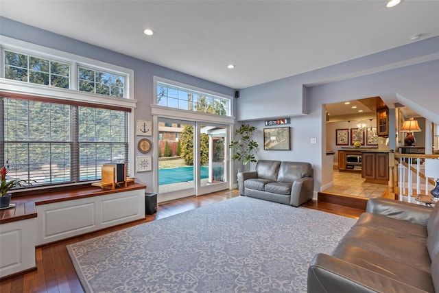 living room featuring recessed lighting and wood-type flooring