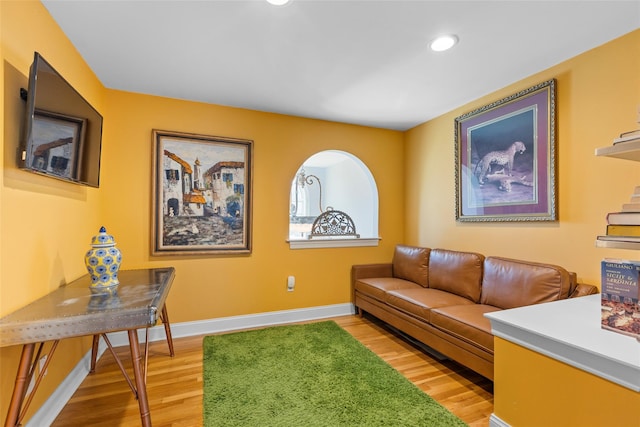 interior space with recessed lighting, light wood-type flooring, and baseboards