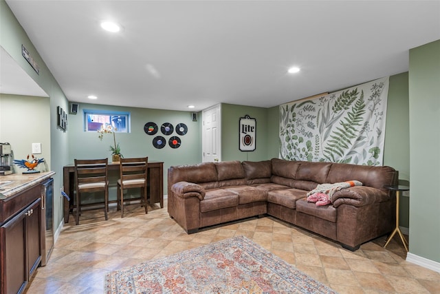 living room featuring wine cooler, recessed lighting, and baseboards