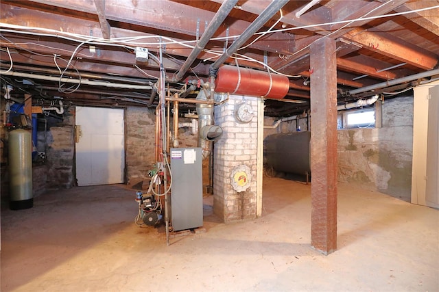 basement featuring heating fuel and a heating unit