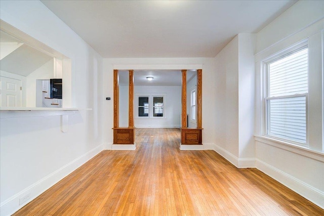 interior space with light wood-style flooring and baseboards