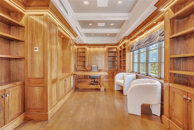 sitting room with built in features, light wood-style floors, and ornamental molding