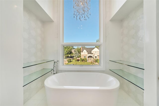 bathroom featuring a freestanding tub