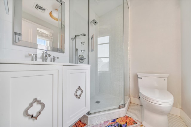 bathroom featuring visible vents, toilet, a stall shower, tile patterned flooring, and vanity