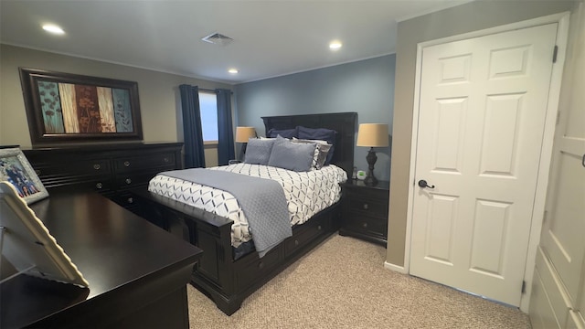 bedroom featuring recessed lighting, visible vents, light carpet, and crown molding