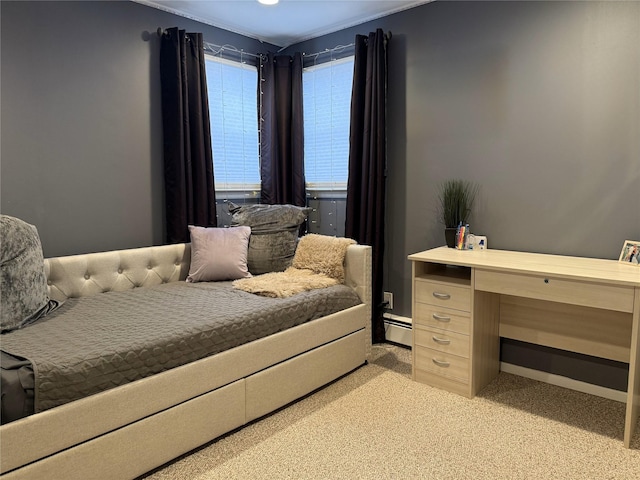 bedroom featuring a baseboard radiator, baseboards, and carpet flooring