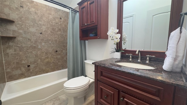 bathroom featuring shower / tub combo, toilet, and vanity