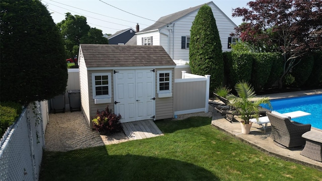 exterior space with a fenced in pool and a fenced backyard