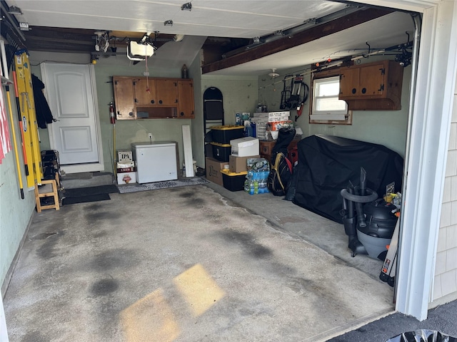 garage featuring a garage door opener