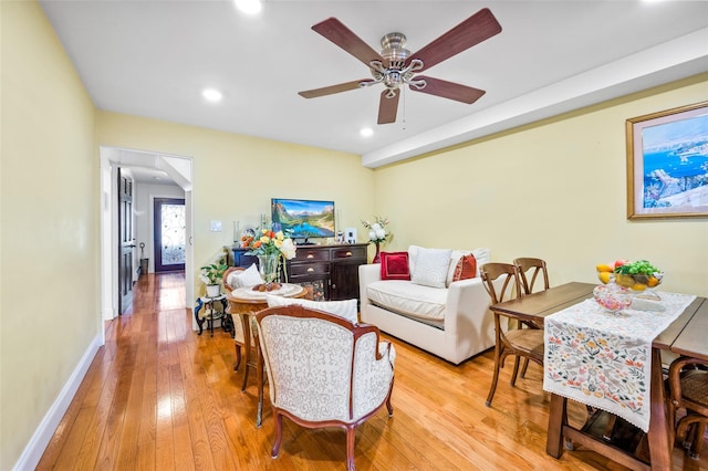 living area featuring recessed lighting, ceiling fan, baseboards, and hardwood / wood-style floors