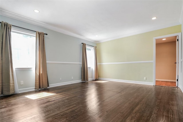 unfurnished room featuring ornamental molding, recessed lighting, wood finished floors, and baseboards