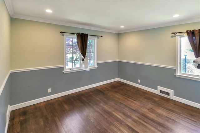 unfurnished room featuring recessed lighting, wood finished floors, visible vents, and baseboards