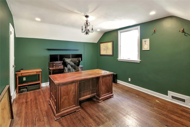 office area with lofted ceiling, dark wood-style flooring, visible vents, and baseboards