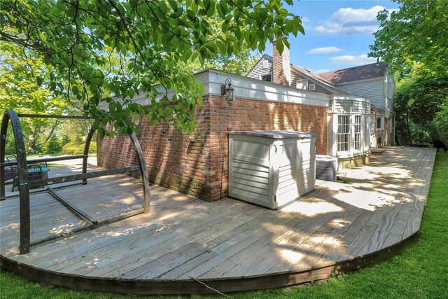 wooden terrace with central AC unit