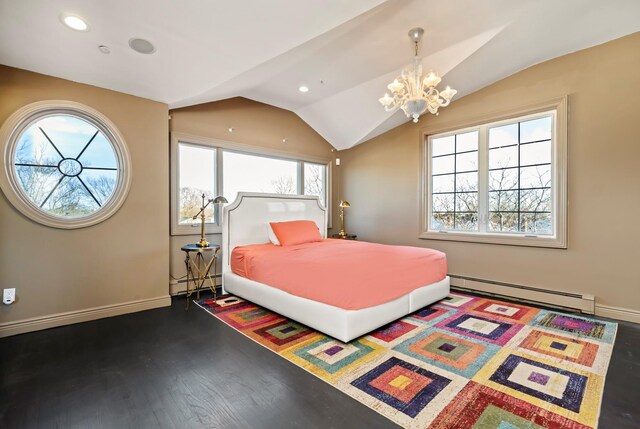 bedroom with baseboard heating, a notable chandelier, multiple windows, and vaulted ceiling