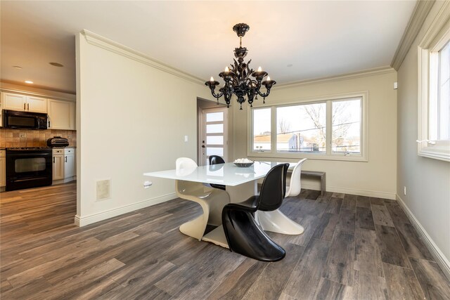 dining area with an inviting chandelier, baseboards, ornamental molding, and dark wood-style flooring
