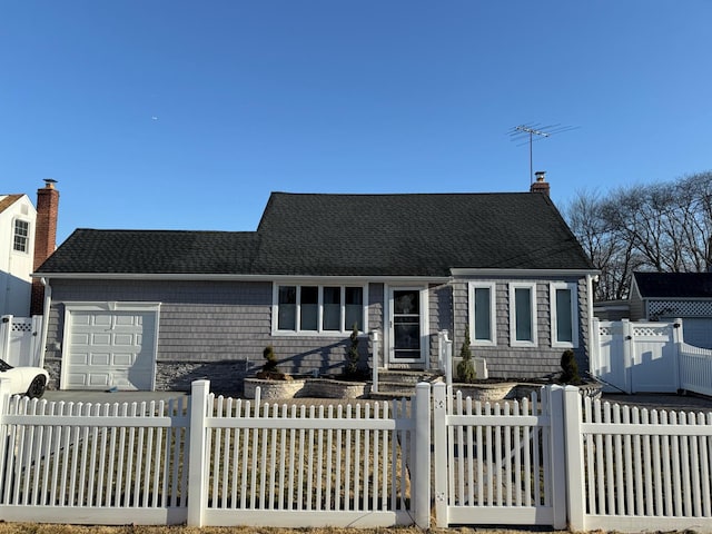 view of front of home with a gate, a fenced front yard, an attached garage, a shingled roof, and a chimney