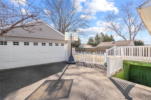 garage with fence