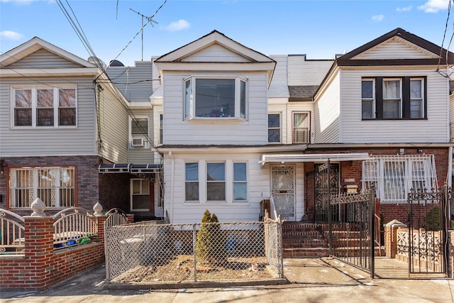 view of property with a fenced front yard