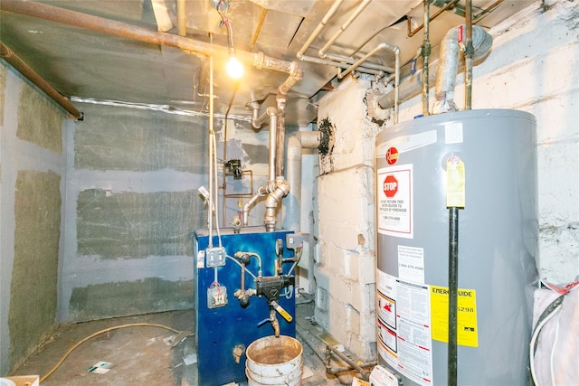 utility room with a heating unit and gas water heater