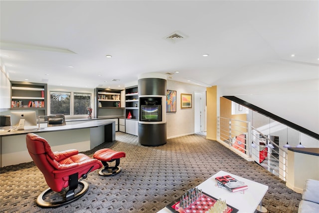 kitchen featuring carpet floors, recessed lighting, visible vents, and built in study area