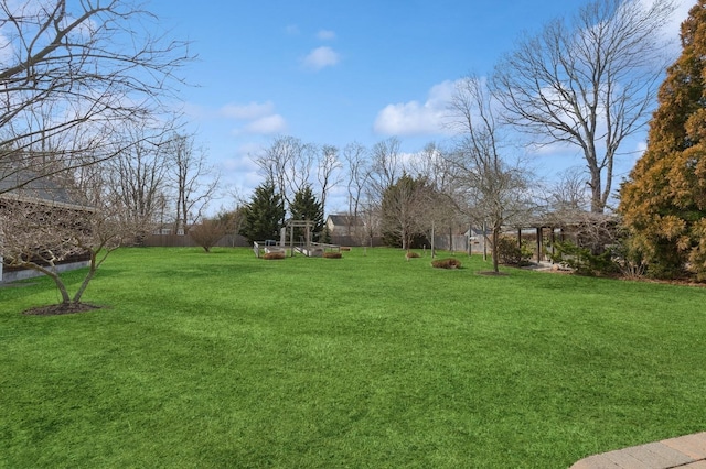 view of yard featuring fence