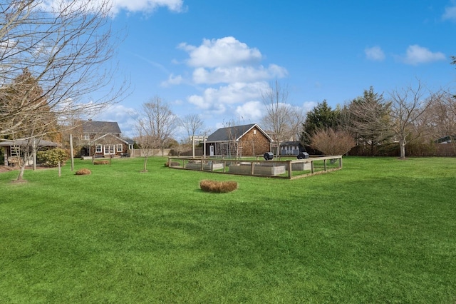 view of yard featuring a vegetable garden