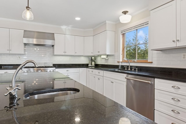 kitchen featuring a sink, stainless steel dishwasher, white cabinets, and wall chimney range hood