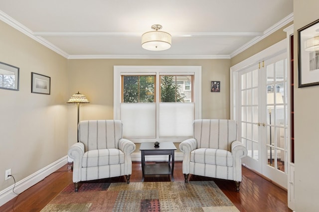 sitting room with wood finished floors, baseboards, french doors, and ornamental molding