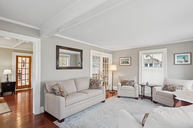 living area with baseboards, dark wood-type flooring, and ornamental molding