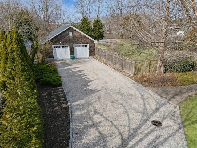 garage featuring fence