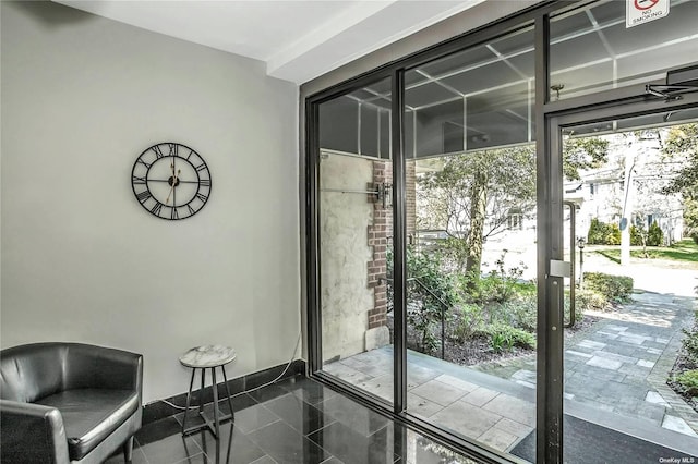 entryway with tile patterned floors