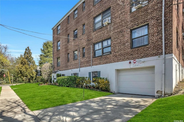 view of property with driveway and an attached garage