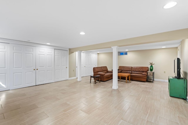 interior space with recessed lighting and baseboards