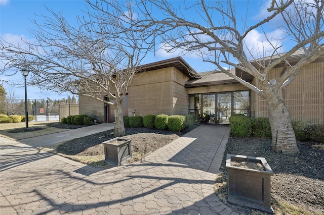 exterior space with concrete block siding