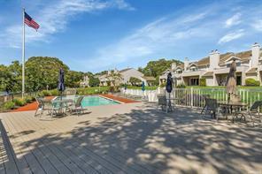 view of swimming pool with a deck