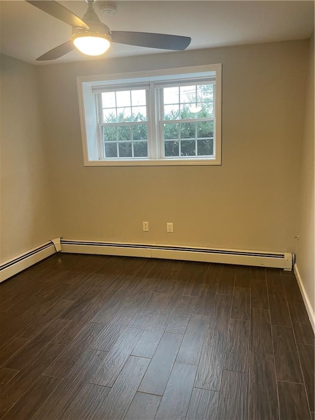 unfurnished room with a healthy amount of sunlight, a baseboard radiator, ceiling fan, and dark wood-type flooring