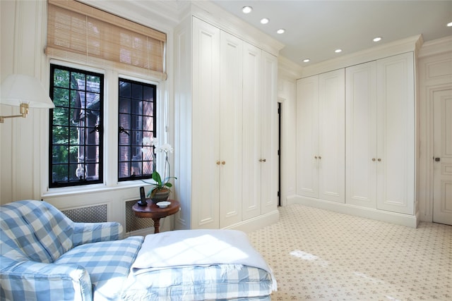 bedroom featuring light carpet and recessed lighting