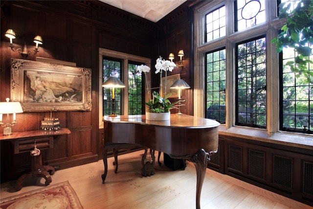 107 Bayview Rd, Manhasset, NY 11030 - office featuring wood walls, plenty of natural light, and wood finished floors