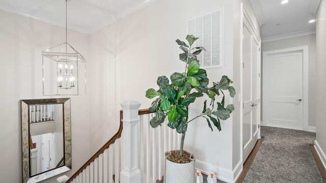 hallway with a notable chandelier, recessed lighting, an upstairs landing, baseboards, and carpet