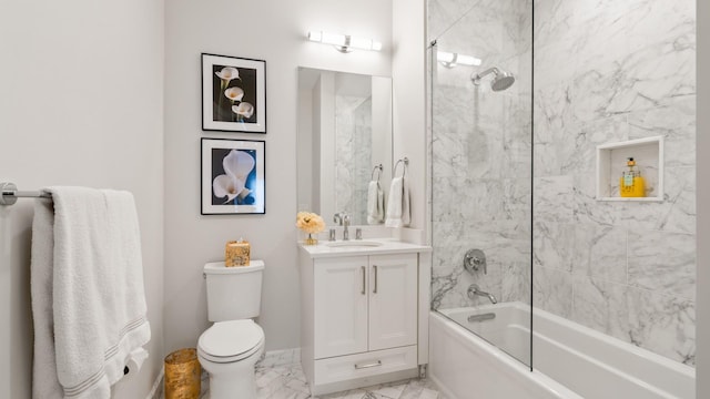 bathroom featuring marble finish floor, tub / shower combination, vanity, and toilet