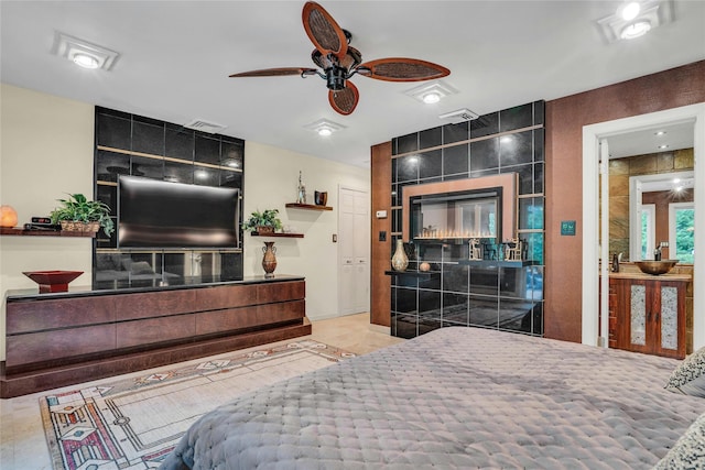 bedroom featuring visible vents and ceiling fan