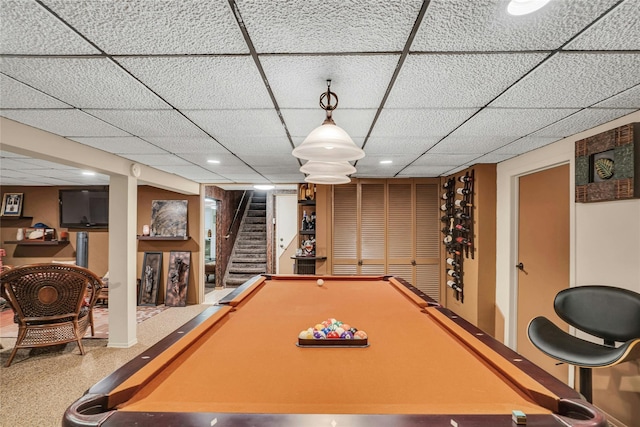 game room featuring a paneled ceiling