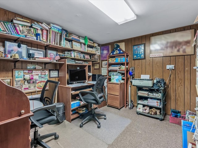 office space with wooden walls and carpet