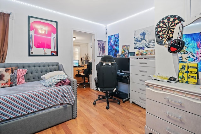 bedroom featuring light wood finished floors