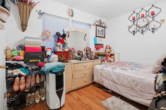 bedroom with light wood-type flooring