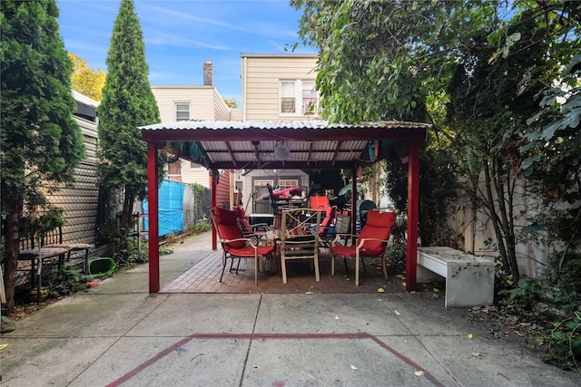view of patio / terrace featuring fence
