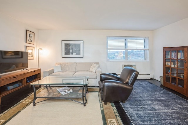 living area with a baseboard heating unit and a wall mounted air conditioner